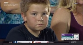 Kid at World Series of Baseball looks deep into audience’s soul.