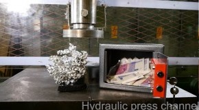 Crushing safe and sculpture with hydraulic press