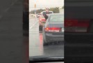 Dog Tries To Eat RainDrops Out Of Car Window