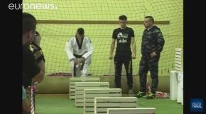 Taekwondo Champion Smashes 111 Building Blocks With His Head