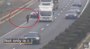 Dumb Hitchhiker Almost Gets Run Over