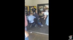Man Detained by Several People in Store