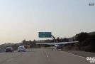 Car Dashcam Captures Small Plane Landing On California Freeway