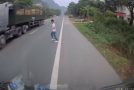 Two Trucks Avoid Clueless Pedestrian