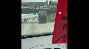 Giant Spool Falls off Truck, Rolls Down Highway