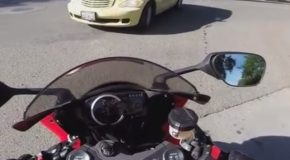 Guy Hits Motorcycle Gets Window Punched In