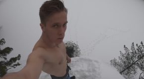 Dude Jumps Off A 35-Foot Cliff Into A Tiny Ice Hole