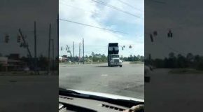 Raised Truck-Bed Takes out Traffic Lights