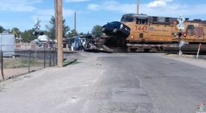Train Takes Out Car Carrier