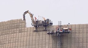 Excavator On 600 Feet Cooling Tower