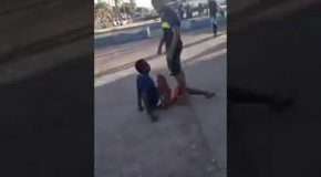 Guy Tries Throwing Flashy Kick In Street Fight, Fails Miserably