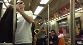 Two Strangers On A Subway Have An Epic Saxophone Battle!