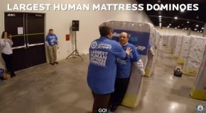 Guinness World Record For The Largest Human Mattress Dominoes!