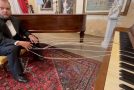 Musician Plays The Piano Remotely Using Strings!