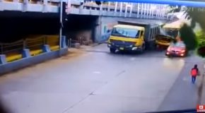 Bus Crashes Into A Tipper Truck!