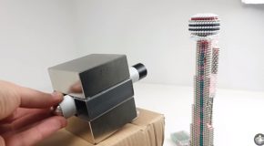 Taking Down A CN Tower Of Magnetic Balls With A Magnet Cannon