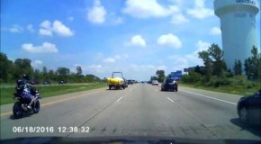 Motorcycle hits unsecured load