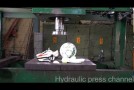 Crushing football stuff with hydraulic press
