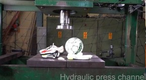 Crushing football stuff with hydraulic press