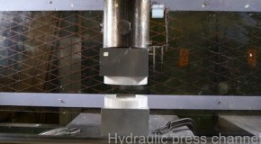 Pressing two repelling neodymium magnets together with hydraulic press