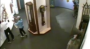 Man touches priceless museum clock