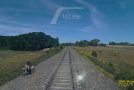 Biker Jumps Out Of The Way Of Uncoming Train
