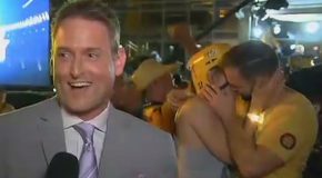 Kissing Couple Caught on Camera Behind Reporter