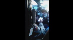 Cop Caught Texting While Driving By Detainee