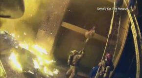 Fireman Catches Child From Burning Building