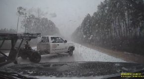 Pickup Truck With Trailer Jackknifes Off the Road During a Blizzard
