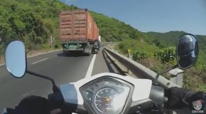 Truck Pushes Motorcycle Off Road, Clipping Rider