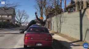 Man Performs Amazing Backflip Over a Parked Car