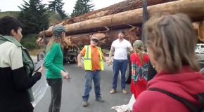 Driver Pulls Protester off of Log Truck