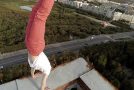 Guy Performs Impressive Handstand On Rooftop