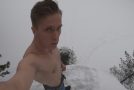 Dude Jumps Off A 35-Foot Cliff Into A Tiny Ice Hole