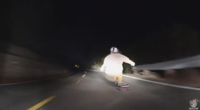 Skilled Nighttime Downhill Skateboarding