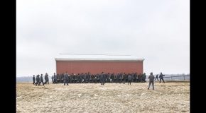 Watch 250 Amish Men Move a Barn With Pure Manpower