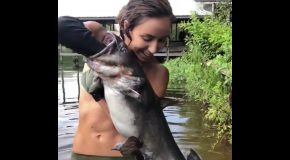 Little Hottie Shoves Her Hand Down Giant Fish’s Gullet
