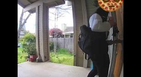 Woman Fails To Open Door With Pizza In Her Hands