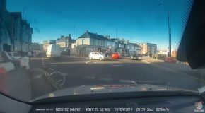 Car Collides with Cyclist in Roundabout