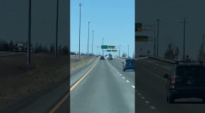 Airplane Lands In A Busy Highway