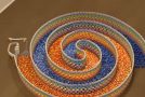 Making An Amazing Triple Spiral With 15,000 Dominoes!