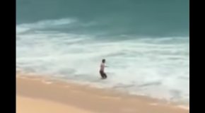 Guy At The Beach Gets Body Slammed By A Huge Wave!