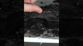 Crushing A Ball Of Black Obsidian