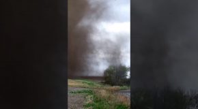 Tornado Touches Down Almost Beside Fisherman, He Does Not Care!