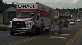 Jaywalking Lady Flipping Off Drivers Walks Into A U-Haul Truck!
