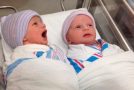Newborn Twins In The Cot Talk To Each Other