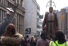 People Watch As The Giants Pass Through The Streets Of Liverpool