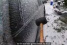 Breaking Chunks Of Ice Off A Truck