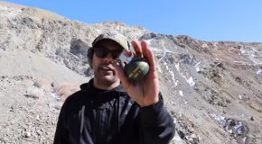 Man Throws A Grenade Into A Frozen Lake